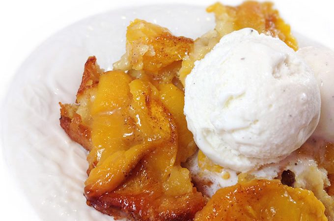 Roasted Peach Cobbler. The batter underneath cooks, bubbles up all around the peaches. Gets all crispy and yummy on the edges. Fabulous!!!