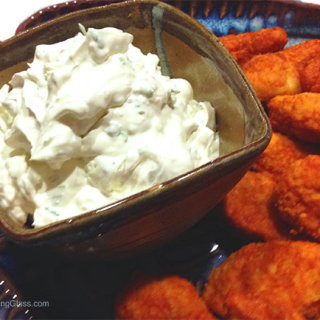 Blue Cheese Dip is a great accompaniment to buffalo wings. The creamy dip cools the spiciness of the wings.