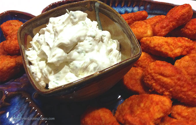 Blue Cheese Dip is a great accompaniment to buffalo wings. The creamy dip cools the spiciness of the wings.