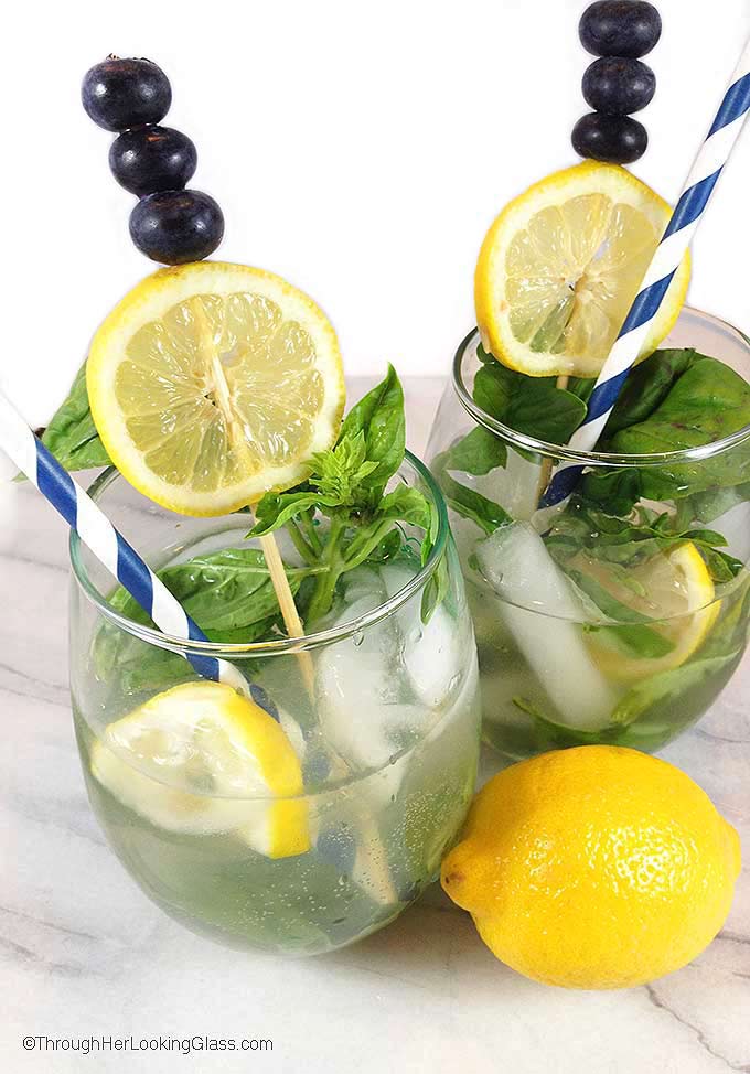 Blueberry Basil Mojito: A refreshing cocktail perfect for patio or poolside. Cointreau, Cold River Blueberry vodka and lemons mingle for the perfect mojito.