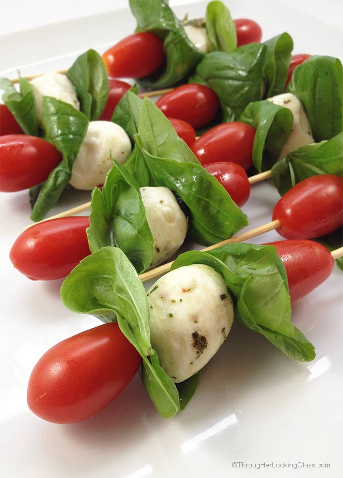 Caprese Mini Kabobs: a quick healthy treat. The easiest most colorful garden fresh appetizer you'll ever make. The perfect accompaniment to grilled burgers.