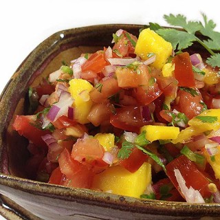 Garden Fresh Mango Salsa. This recipe evolved over the last few years with fresh veggies harvested from our gardens: tomatoes, jalapeño peppers & cilantro.