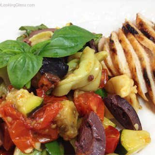 Roasted Veggie Mediterranean Tortellini. Fresh pasta salad. Eggplant, red pepper, tortellini, kalamata olives, cherry tomatoes, basil, zucchini.