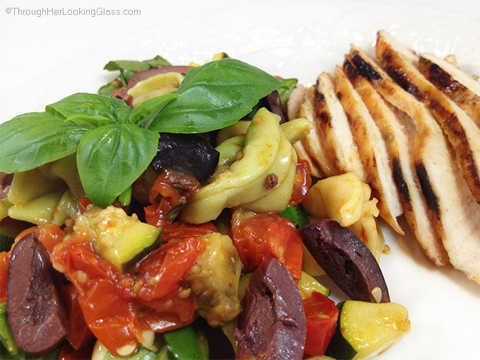 Roasted Veggie Mediterranean Tortellini. Fresh pasta salad. Eggplant, red pepper, tortellini, kalamata olives, cherry tomatoes, basil, zucchini.