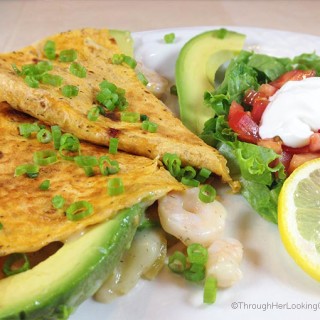 Summery Quesadilla De Marisco. Stuffed with fresh avocado slices, shrimp, melted Havarti dill cheese and green chilies. Light, res and delicious!