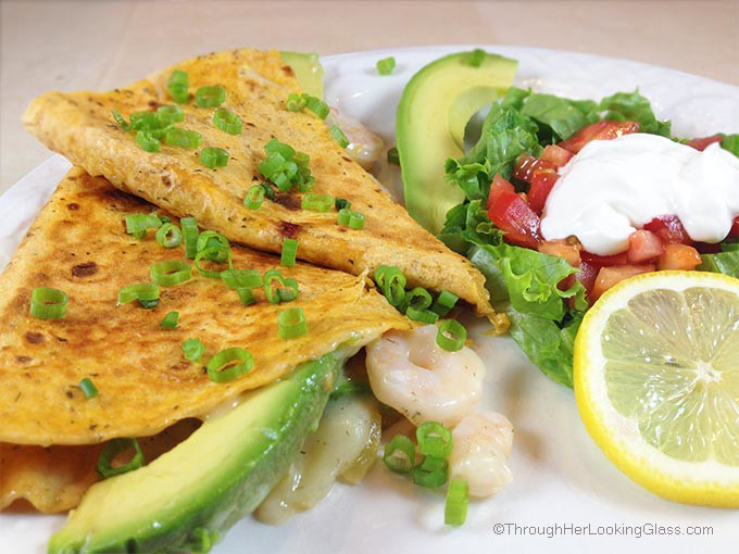 Summery Quesadilla De Marisco. Stuffed with fresh avocado slices, shrimp, melted Havarti dill cheese and green chilies. Light, res and delicious!