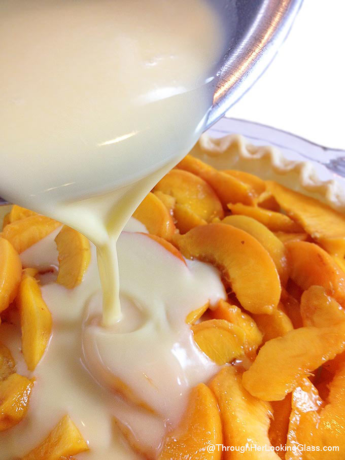 the fresh peaches and raw custard used to make the filling for this homemade peach pie