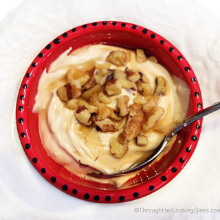 Slow Cooker Maple Vanilla Bean Yogurt. Maple syrup & vanilla bean paste add delicious flavor to thick yogurt. Drizzle w/ maple syrup and top with walnuts.