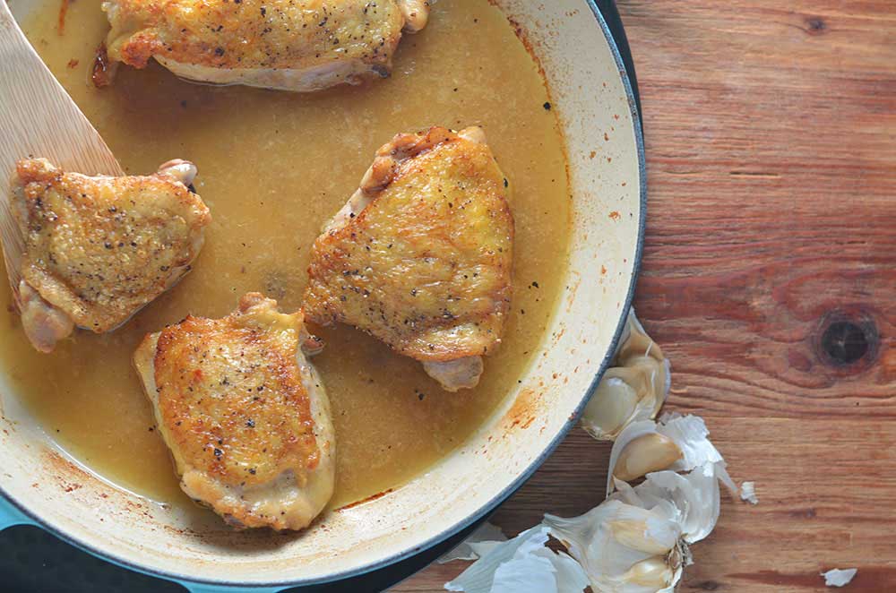 Garlic Chicken Thighs: tender chicken thighs in garlic sauce w/crispy, delicious skin. Easy. Chicken stock & garlic bring extra flavor to the table.