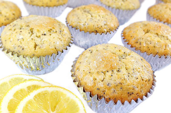 Bakery Lemon and Poppy Seed Muffins are tender, caky bakery-style muffins with cracked & sugary crunchy tops. W/vanilla & almond extracts and lemon zest.