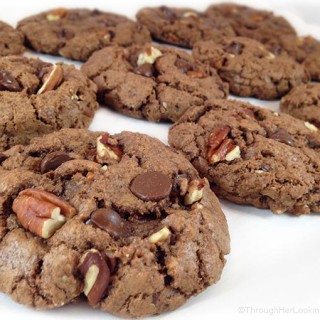 Bakery Style Chocolate Chocolate Chip Cookies are crunchy on the outside, chewy on the inside. Chock full of dark chocolate chips, pecans and cocoa. Yummers!