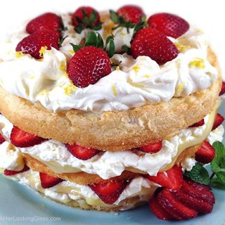 Fresh Strawberry and Lemon Angel Food Cake. Cake layers with fresh strawberries, lemon curd and homemade lemon whipping cream. Stunning and easy dessert!