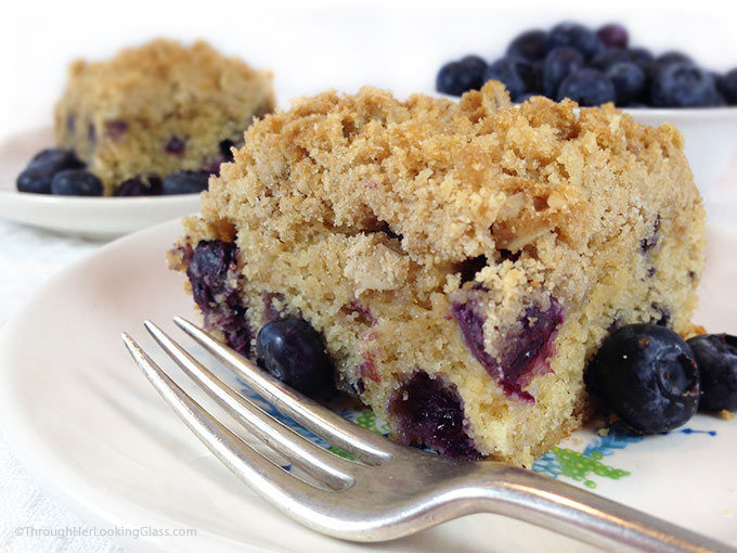 Healthier Oatmeal Streusel Blueberry Breakfast Cake. Tender coffee cake packed w/plump blueberries. White whole wheat flour & coconut oil. A healthier breakfast option.