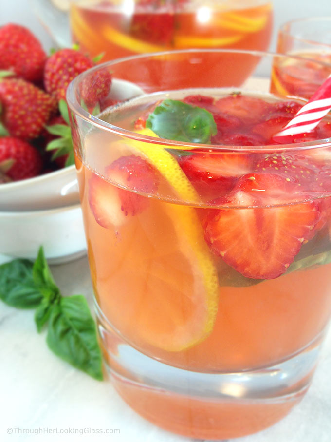 Refreshing Strawberry Basil Lemonade: perfect summer mocktail for everyone! Fresh basil steeps in strawberry simple syrup for an unusually delicious sipper!