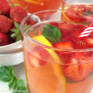 Refreshing Strawberry Basil Lemonade: perfect summer mocktail for everyone! Fresh basil steeps in strawberry simple syrup for an unusually delicious sipper!