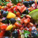 Fresh Peach Blueberry Salsa: fruity salsa with a delicious bite! This fresh salsa is so addictive. The peaches and blueberries are a sweet surprise!