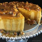 Maple Pumpkin Cheesecake w/Maple Praline Pecan Sauce. Creamy pumpkin cheesecake with a hint of maple smothered in buttery maple praline pecan sauce!