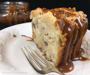 A piece of apple cake with salted caramel on top