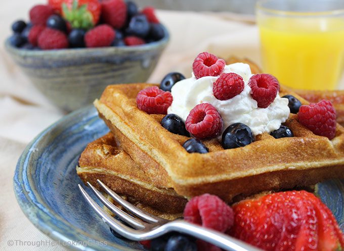 Pair these tender, golden White Wheat Buttermilk Waffles with fresh berries and powdered sugar or butter and maple syrup for a delicious treat.