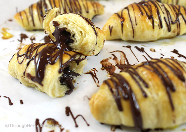 Pain Au Chocolat (Chocolate Croissant Recipe): Light, flaky, chocolate-filled buttery croissants with chocolate drizzle. Impressive bakery-style pastries.