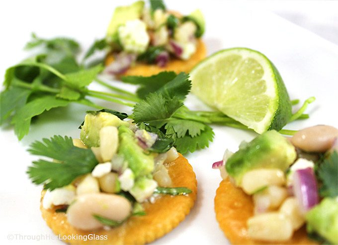 Easy Spring Appetizers w/Fresh Herbs! Herbs mingle w/veggies, cheese and fresh ingredients to create flavorful, scrumptious toppings for Ritz Crackers!