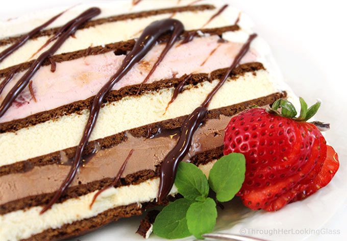 This Easy Neapolitan Ice Cream Sandwich Cake Recipe is fast fast fast to make. And it disappears just as quickly too. Layer ice cream and fudge sauce between ice cream sandwiches and you're good to go! Say goodbye to expensive store bought ice cream cakes this summer.