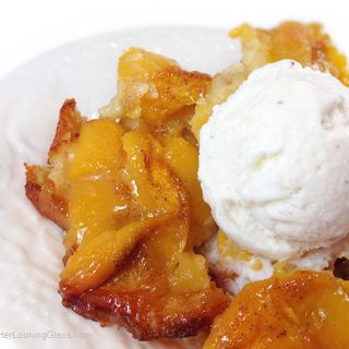 Roasted Peach Cobbler. The batter underneath cooks, bubbles up all around the peaches. Gets all crispy and yummy on the edges. Fabulous!!!