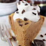 This French Silk Pie Recipe from Bar Harbor is a rich, homemade chocolate mousse consisting of eggs, cream, chocolate, sugar, and butter. It's topped with heavy cream whipped with creme de cacao. (Shriek!)