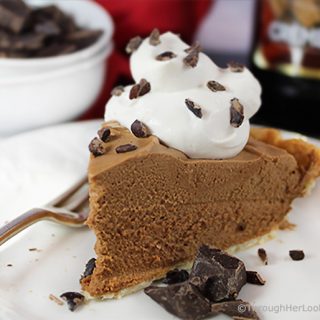 This French Silk Pie Recipe from Bar Harbor is a rich, homemade chocolate mousse consisting of eggs, cream, chocolate, sugar, and butter. It's topped with heavy cream whipped with creme de cacao. (Shriek!)