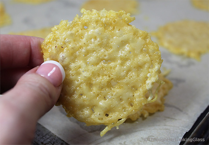 Salty, crispy, low carb and addictive: Easy Gourmet Baked Parmesan Cheese Crisps. You'll love these easy to make oven baked cheese crisps.