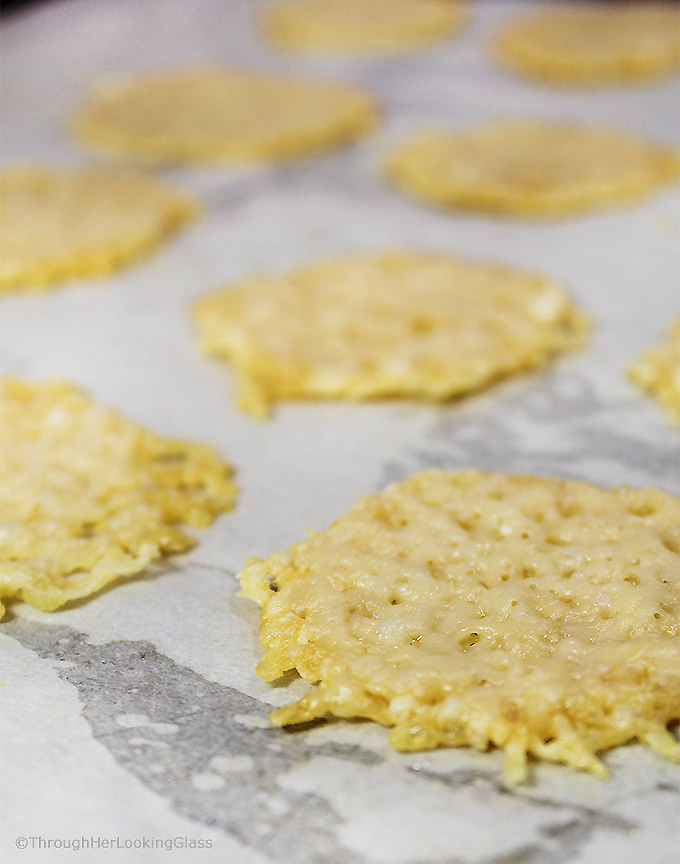 Salty, crispy, low carb and addictive: Easy Gourmet Baked Parmesan Cheese Crisps. You'll love these easy to make oven baked cheese crisps.