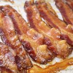 How to Bake Bacon in the Oven. Baking bacon is so much easier (and less messy) than frying it on the stovetop or cooking it in the microwave. Learn all the best tips to bake bacon in the oven today!