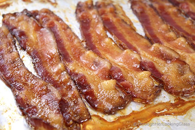 How to Bake Bacon in the Oven. Baking bacon is so much easier (and less messy) than frying it on the stovetop or cooking it in the microwave. Learn all the best tips to bake bacon in the oven today!