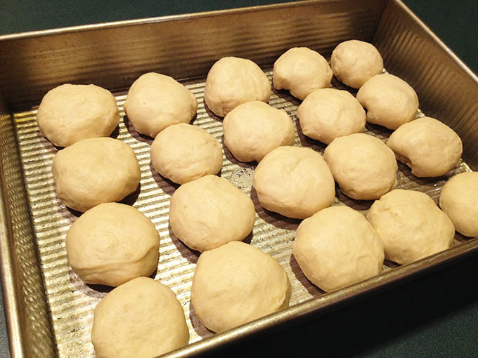 Love these pillowy homemade Yeast Roll, hot and fresh from the oven. Split 'em in half, melt a pat of butter in between. These yeast Rolls are divine.