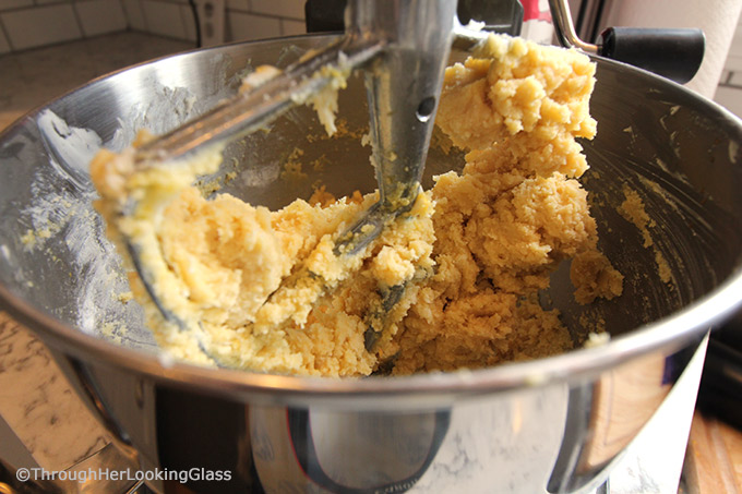 Here's a buttery shortbread Lemon Curd Easy Thumbprint Cookie Recipe for cheerful springtime baking! Buttery shortbread cookies nest dollops of yummy sweet & sour lemon curd. If you love lemon curd like I do, this is the easy cookie for you!