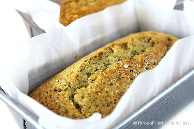 Almond Glazed Lemon Poppy Seed Bread is a moist and scrumptious sweet bread with a crackly almond glaze. Easy to make in one bowl, this bread is not your typical lemon poppy seed bread.