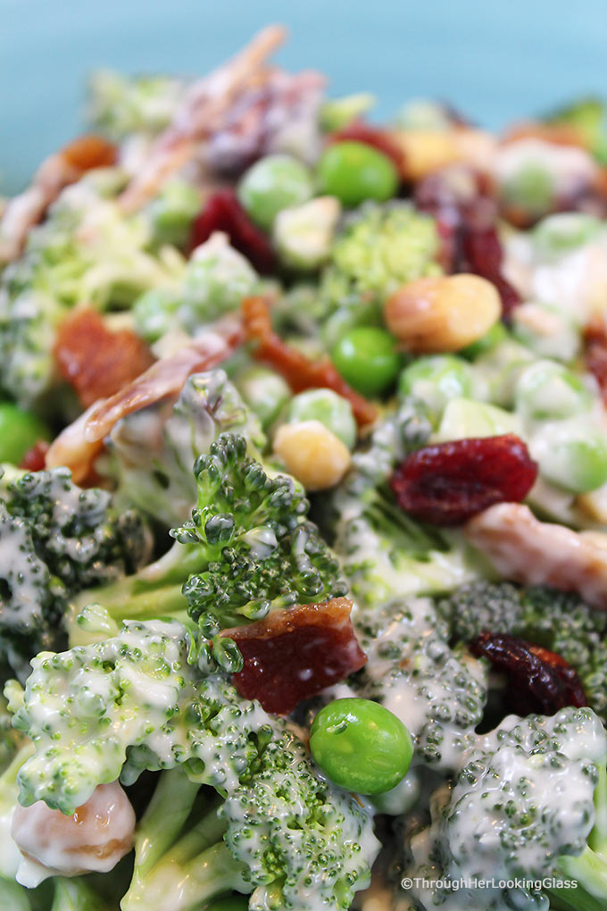 Crunchy Broccoli Salad with Bacon is the perfect side dish for all your picnics and barbecues this summer! It combines surprising ingredients - salty and sweet - making for a yummy new salad that won't wilt!