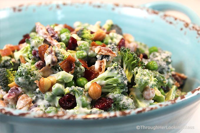 Crunchy Broccoli Salad with Bacon is the perfect side dish for all your picnics and barbecues this summer! It combines surprising ingredients - salty and sweet - making for a yummy new salad that won't wilt!