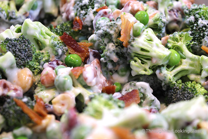 Crunchy Broccoli Salad with Bacon is the perfect side dish for all your picnics and barbecues this summer! It combines surprising ingredients - salty and sweet - making for a yummy new salad that won't wilt!