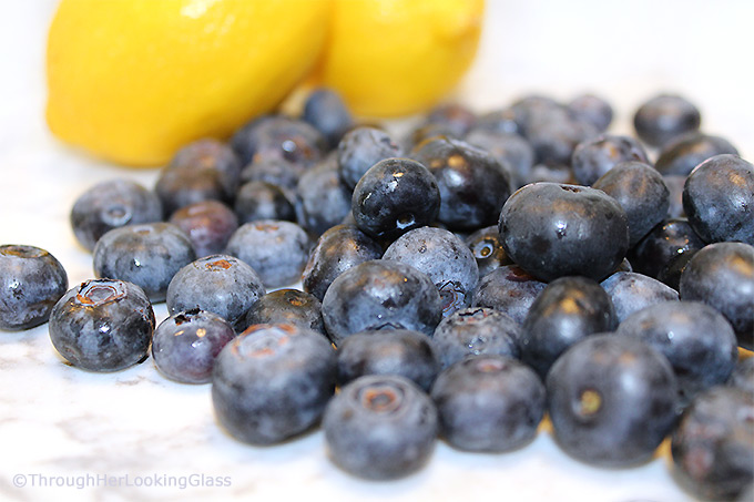 A generous slice of this Glazed Lemon Blueberry Pound Cake is especially scrumptious on the sun porch accompanied by a tall glass of fresh squeezed lemonade. And a sprig of mint. Tender, buttery lemon pound cake is studded with fresh, juicy blueberries for the perfect summer combo.