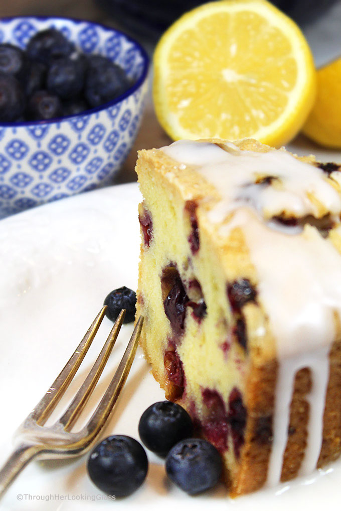 A generous slice of this Glazed Lemon Blueberry Pound Cake is especially scrumptious on the sun porch accompanied by a tall glass of fresh squeezed lemonade. And a sprig of mint. Tender, buttery lemon pound cake is studded with fresh, juicy blueberries for the perfect summer combo.