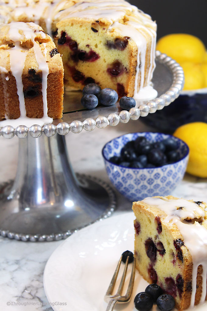 A generous slice of this Glazed Lemon Blueberry Pound Cake is especially scrumptious on the sun porch accompanied by a tall glass of fresh squeezed lemonade. And a sprig of mint. Tender, buttery lemon pound cake is studded with fresh, juicy blueberries for the perfect summer combo.