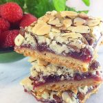 These old-fashioned Peach & Raspberry Shortbread Squares (w/Almonds) are perfect for picnics and lunch boxes this summer. Crunchy and sweet, buttery and packed with peach, almond & raspberry flavor.