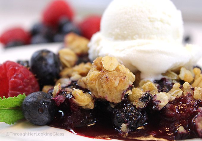 This Summer Triple Berry Crumble Recipe has all the berry-licious fresh summer flavors you crave: blueberries, blackberries and raspberries. All topped with a sweet and crunchy oatmeal crumble.