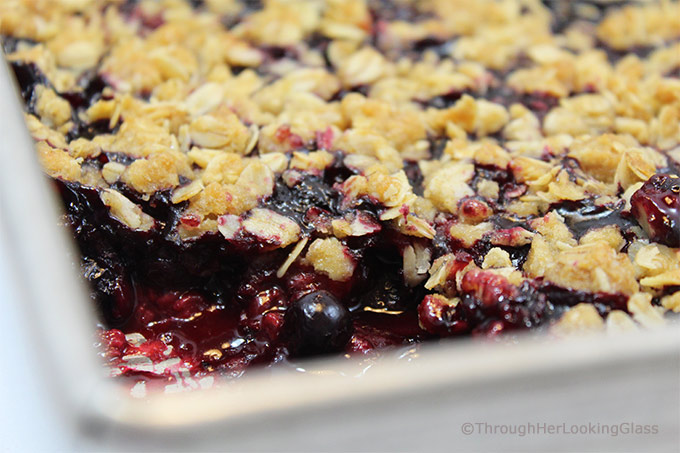 This Summer Triple Berry Crumble Recipe has all the berry-licious fresh summer flavors you crave: blueberries, blackberries and raspberries. All topped with a sweet and crunchy oatmeal crumble.