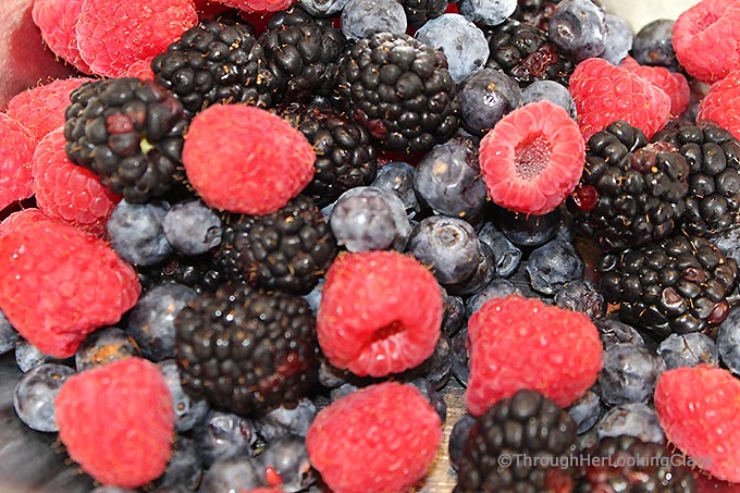 This Summer Triple Berry Crumble Recipe has all the berry-licious fresh summer flavors you crave: blueberries, blackberries and raspberries. All topped with a sweet and crunchy oatmeal crumble.