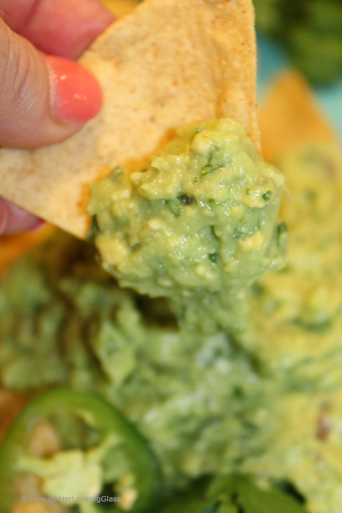 If you're a guac lover hankering for the addictive Original Chipotle Guacamole Recipe, the search is over! Creamy, mildly spicy guacamole is made with the freshest ingredients: ripe avocado, minced jalapeño and red onion, fresh squeezed lime juice and chopped cilantro.