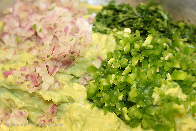 If you're a guac lover hankering for the addictive Original Chipotle Guacamole Recipe, the search is over! Creamy, mildly spicy guacamole is made with the freshest ingredients: ripe avocado, minced jalapeño and red onion, fresh squeezed lime juice and chopped cilantro.