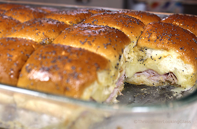 Brown Sugar Hawaiian Roll Ham Sliders w/VT Cheddar! Sweet King's Hawaiian rolls are layered with sliced ham and VT cheddar cheese. Then brushed with a sweet and spicy brown sugar glaze and baked.