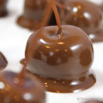 Homemade Chocolate Covered Cherries are a pop of delicious flavors in your mouth! Dunk dye-free, preservative free maraschino cherries in chocolate for an extra special treat at the holidays. Soak cherries in rum, brandy or alcohol first for extra flavor pop!